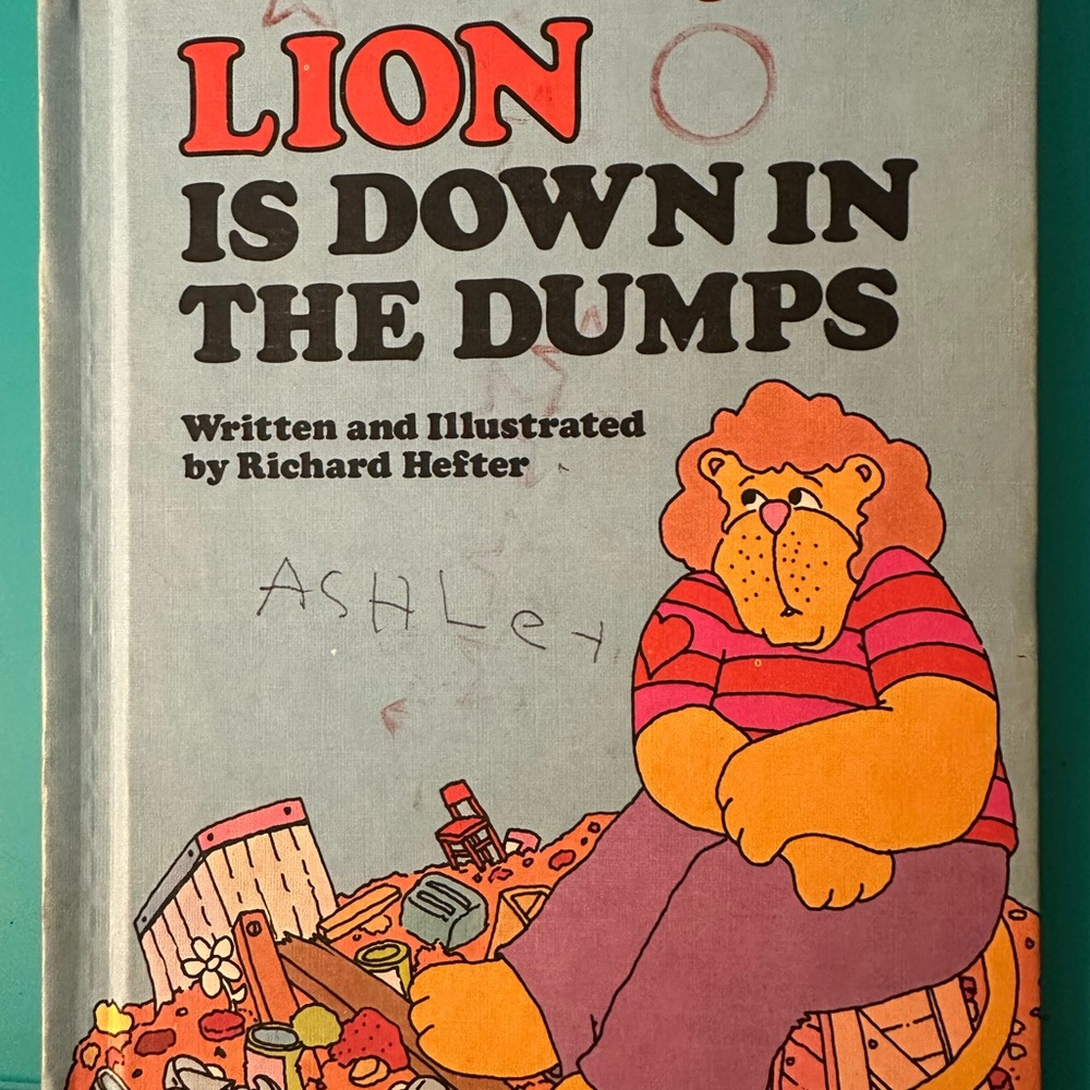 Orange and Red Cartoon Lion Book Cover